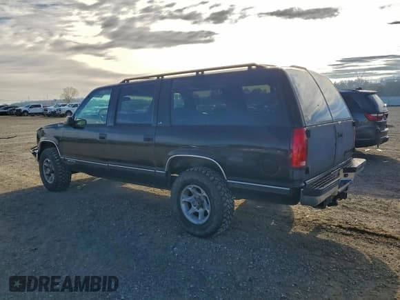 ✅ 1999 Chevrolet Suburban • VIN: 1GNFK16R6XJ567728 • Лот: 94811155. Опубликован ранее на Copart с пробегом 205 904 миль. Бесплатный доступ к архиву аукционных продаж из США и подробный отчёт об истории автомобиля на DreamBid. Изображение 2.