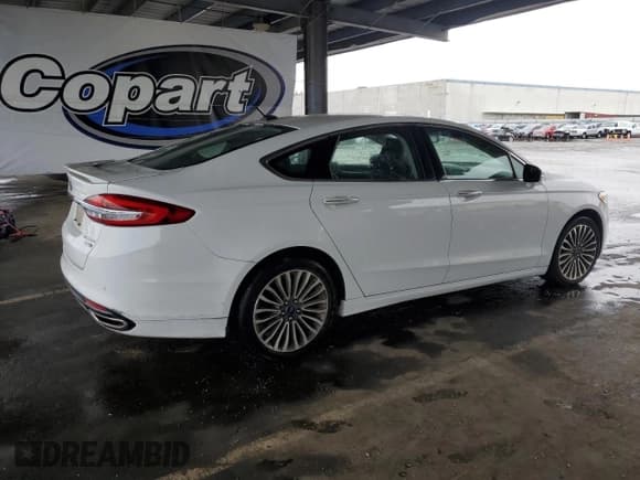 ✅ 2018 Ford Fusion Titanium • VIN: 3FA6P0D99JR234448 • Lot: 92979875. Listed on Copart with 121,879 mi. Free auction sales archive from the USA and detailed vehicle history report at DreamBid. Image 3.