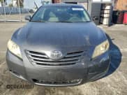 ✅ 2007 Toyota Camry LE • VIN: 4T1BE46K97U152447 • Lot: 95094045. Wystawiony na Copart z przebiegiem 191 066 mil. Bezpłatny archiwum sprzedaży aukcyjnych z USA i szczegółowy raport historii pojazdu na DreamBid. Zdjęcie 5.