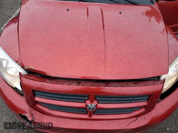 2008 Dodge Caliber SE z VIN 1B3HB28C58D776315, wystawiony jako Copart lot #52914815 z przebiegiem 118 407 mil mil oraz Szkoda całkowita • Salvage title. Historia ofert i sprzedaży dostępna na DreamBid. Obrazek 14.