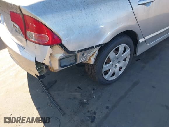 ✅ 2007 Honda Civic LX • VIN: 2HGFA16527H311419 • Lot: 43822082. Listed on IAAI with 208,415 mi. Free auction sales archive from the USA and detailed vehicle history report at DreamBid. Image 6.