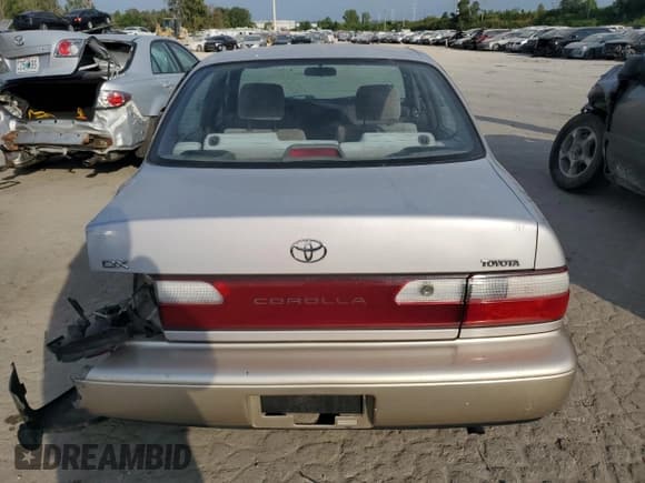 ✅ 1996 Toyota Corolla DX • VIN: 1NXBB02E2TZ460233 • Lot: 70602554. Wystawiony na Copart z przebiegiem 153 657 mil. Bezpłatny archiwum sprzedaży aukcyjnych z USA i szczegółowy raport historii pojazdu na DreamBid. Zdjęcie 6.