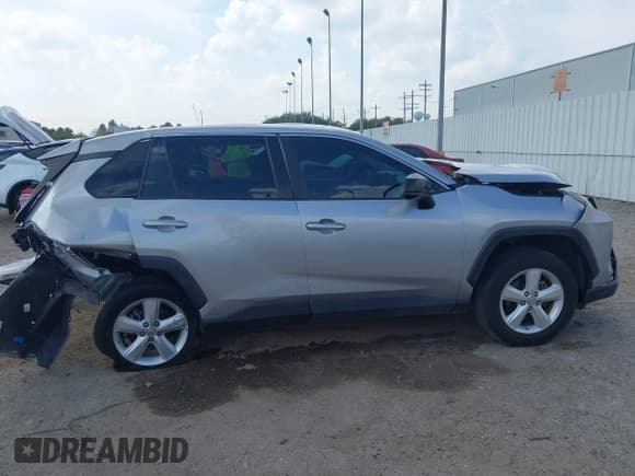✅ 2022 Toyota RAV4 LE • VIN: 2T3H1RFV2NC187740 • Lot: 43523934. Listed on IAAI with 27,272 mi. Free auction sales archive from the USA and detailed vehicle history report at DreamBid. Image 13.