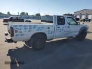 ✅ 2002 Nissan Frontier XE • VIN: 1N6ED29X12C327348 • Lot: 69881135. Listed on Copart with 257,546 mi. Free auction sales archive from the USA and detailed vehicle history report at DreamBid. Image 3.