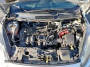 ✅ 2016 Ford Fiesta S • VIN: 3FADP4AJ8GM105345 • Lot: 87416335. Wystawiony na Copart z przebiegiem 93 302 mil. Bezpłatny archiwum sprzedaży aukcyjnych z USA i szczegółowy raport historii pojazdu na DreamBid. Zdjęcie 11.