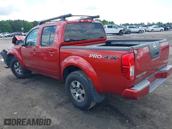✅ 2012 Nissan Frontier Pro-4X • VIN: 1N6AD0EV3CC439870 • Lot: 42269470. Listed on IAAI with 165,597 mi. Free auction sales archive from the USA and detailed vehicle history report at DreamBid. Image 3.