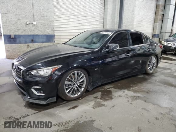 ✅ 2018 Infiniti Q50 Luxe • VIN: JN1EV7AR6JM438483 • Лот: 89700765. Опубликован ранее на Copart с пробегом 57 423 миль. Бесплатный доступ к архиву аукционных продаж из США и подробный отчёт об истории автомобиля на DreamBid. Изображение 1.