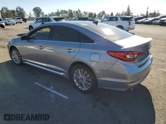 2015 Hyundai Sonata Limited с VIN 5NPE34AF2FH256031, выставлен на аукционе Copart как лот 82531215 с пробегом 72 085 миль миль и Списание • Salvage title. История ставок и продаж доступна на DreamBid. Изображение 2.