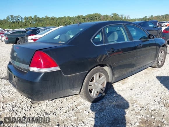 ✅ 2014 Chevrolet Impala LT • VIN: 2G1WB5E31E1150711 • Lot: 43624359. Listed on IAAI with 195,104 mi. Free auction sales archive from the USA and detailed vehicle history report at DreamBid. Image 4.