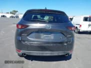 ✅ 2017 Mazda CX-5 Touring • VIN: JM3KFACL4H0136878 • Lot: 43606656. Wystawiony na IAAI z przebiegiem 137 446 mil. Bezpłatny archiwum sprzedaży aukcyjnych z USA i szczegółowy raport historii pojazdu na DreamBid. Zdjęcie 16.
