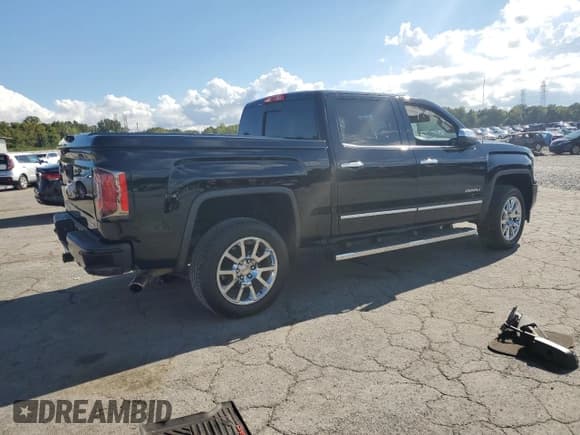 ✅ 2018 GMC Sierra 1500 Denali • VIN: 3GTP1PECXJG404167 • Lot: 84890165. Listed on Copart with 117,981 mi. Free auction sales archive from the USA and detailed vehicle history report at DreamBid. Image 3.