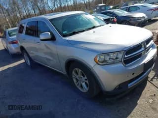 ✅ 2012 Dodge Durango SXT • VIN: 1C4RDJAG9CC112313 • Lot: 43709220. Listed on IAAI with 148,676 mi. Free auction sales archive from the USA and detailed vehicle history report at DreamBid. Image 1.