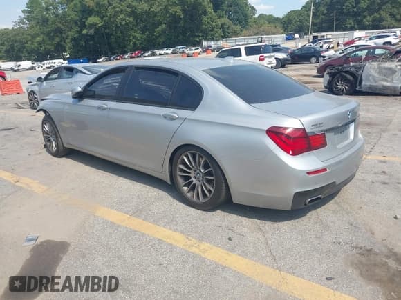 ✅ 2014 BMW 7 Series 740Li • VIN: WBAYE4C58ED138126 • Lot: 43217619. Listed on IAAI with 150,241 mi. Free auction sales archive from the USA and detailed vehicle history report at DreamBid. Image 3.