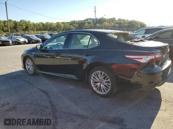 2018 Toyota Camry Hybrid XLE с VIN 4T1B21HKXJU500283, выставлен на аукционе Copart как лот 85726735 с пробегом 119 325 миль миль и Списание • Salvage title. История ставок и продаж доступна на DreamBid. Изображение 2.