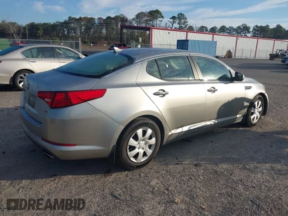 ✅ 2013 Kia Optima LX • VIN: KNAGM4A73D5432741 • Lot: 43787714. Listed on IAAI with 158,639 mi. Free auction sales archive from the USA and detailed vehicle history report at DreamBid. Image 4.