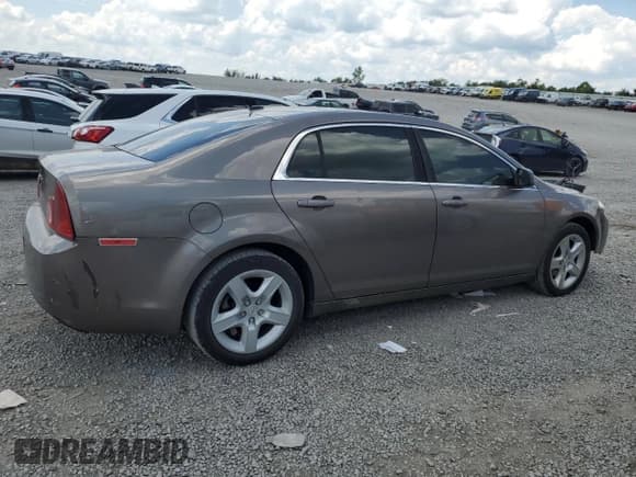 ✅ 2011 Chevrolet Malibu 1LS • VIN: 1G1ZB5E15BF120787 • Lot: 60220634. Listed on Copart with 153,316 mi. Free auction sales archive from the USA and detailed vehicle history report at DreamBid. Image 3.