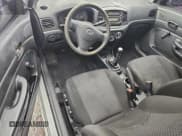 ✅ 2007 Hyundai Accent GS • VIN: KMHCM36C47U041802 • Lot: 94701475. Listed on Copart with 217,195 mi. Free auction sales archive from the USA and detailed vehicle history report at DreamBid. Image 8.