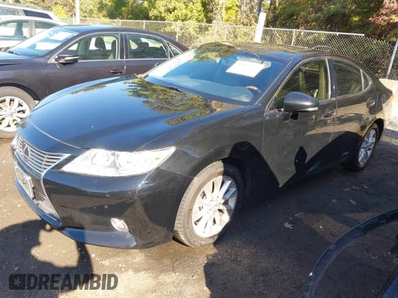 ✅ 2015 Lexus ES 300h • VIN: JTHBW1GG0F2079309 • Lot: 43417364. Listed on IAAI with 226,663 mi. Free auction sales archive from the USA and detailed vehicle history report at DreamBid. Image 17.