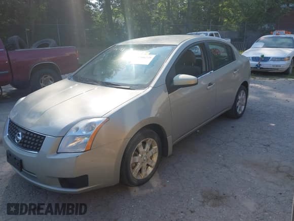 ✅ 2007 Nissan Sentra S • VIN: 3N1AB61E77L716650 • Lot: 42906349. Listed on IAAI with 158,339 mi. Free auction sales archive from the USA and detailed vehicle history report at DreamBid. Image 2.