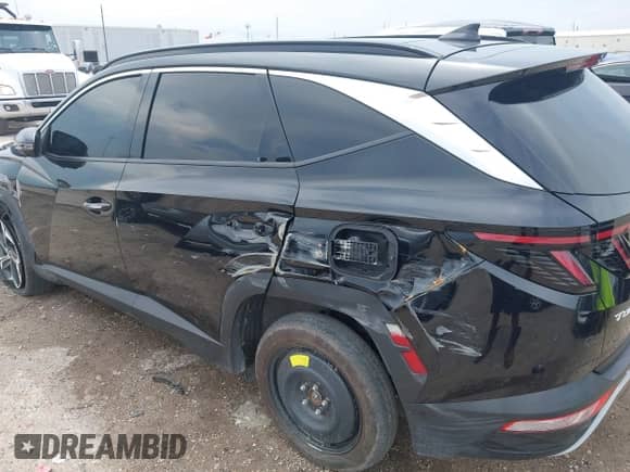 2023 Hyundai Tucson Limited z VIN 5NMJECAE1PH190001, wystawiony jako IAAI lot #43064225 z przebiegiem 54 919 mil mil oraz . Historia ofert i sprzedaży dostępna na DreamBid. Obrazek 18.