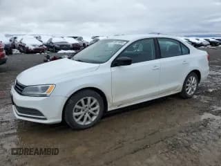 ✅ 2015 Volkswagen Jetta SE • VIN: 3VWD17AJ1FM219874 • Lot: 86115065. Listed on Copart with 143,165 mi. Free auction sales archive from the USA and detailed vehicle history report at DreamBid. Image 1.