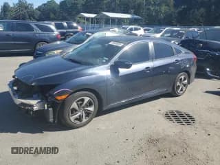 ✅ 2021 Honda Civic LX • VIN: 2HGFC2F65MH516625 • Lot: 85849005. Wystawiony na Copart z przebiegiem 77 676 mil. Bezpłatny archiwum sprzedaży aukcyjnych z USA i szczegółowy raport historii pojazdu na DreamBid. Zdjęcie 1.