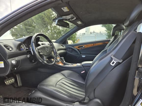 ✅ 2007 Mercedes-Benz SL 55/63 AMG • VIN: WDBSK72F67F128813 • Lot: 87479884. Wystawiony na Copart z przebiegiem 63 756 mil. Bezpłatny archiwum sprzedaży aukcyjnych z USA i szczegółowy raport historii pojazdu na DreamBid. Zdjęcie 5.