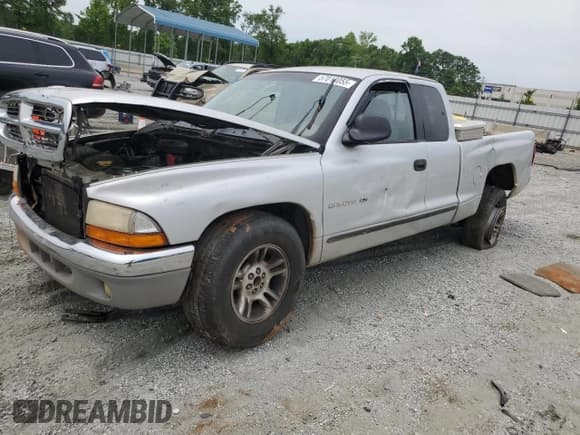 ✅ 2001 Dodge Dakota • VIN: 1B7GL22X01S173048 • Lot: 57018055. Wystawiony na Copart z przebiegiem 163 856 mil. Bezpłatny archiwum sprzedaży aukcyjnych z USA i szczegółowy raport historii pojazdu na DreamBid. Zdjęcie 1.