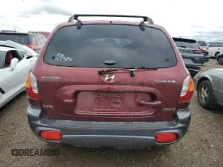 2001 Hyundai Santa Fe GLS z VIN KM8SC83DX1U106345, wystawiony jako Copart lot #81110664 z przebiegiem 103 639 mil mil oraz Czysty tytuł • Clean title. Historia ofert i sprzedaży dostępna na DreamBid. Obrazek 6.