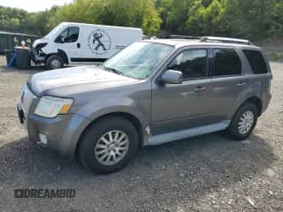 2010 Mercury Mariner Premier with VIN 4M2CN9HG3AKJ25661, listed as a Copart auction lot 69384945 with 154,199 mi miles and Salvage title. Bid and sale history available at DreamBid. Image 1.
