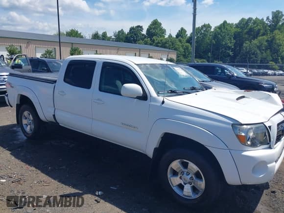 ✅ 2011 Toyota Tacoma • VIN: 3TMMU4FN4BM026455 • Lot: 42845330. Listed on IAAI with 126,500 mi. Free auction sales archive from the USA and detailed vehicle history report at DreamBid. Image 1.
