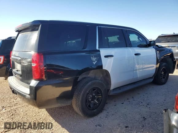 ✅ 2015 Chevrolet Tahoe Commercial • VIN: 1GNLC2EC0FR636271 • Lot: 77180784. Listed on Copart with 132,037 mi. Free auction sales archive from the USA and detailed vehicle history report at DreamBid. Image 3.