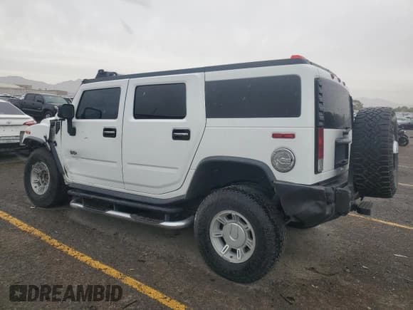 ✅ 2005 Hummer H2 SUV • VIN: 5GRGN23U75H126339 • Lot: 81343495. Wystawiony na Copart z przebiegiem 197 556 mil. Bezpłatny archiwum sprzedaży aukcyjnych z USA i szczegółowy raport historii pojazdu na DreamBid. Zdjęcie 2.
