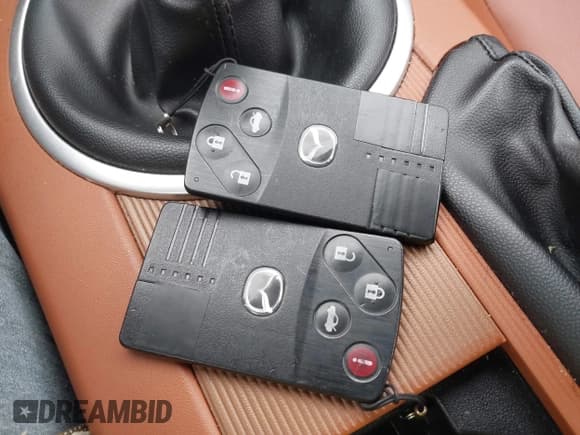 ✅ 2006 Mazda MX-5 Miata Sport • VIN: JM1NC25FX60120273 • Lot: 43774037. Listed on IAAI with 66,933 mi. Free auction sales archive from the USA and detailed vehicle history report at DreamBid. Image 11.