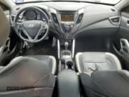 ✅ 2015 Hyundai Veloster Turbo • VIN: KMHTC6AE4FU236455 • Lot: 63483755. Wystawiony na Copart z przebiegiem 110 607 mil. Bezpłatny archiwum sprzedaży aukcyjnych z USA i szczegółowy raport historii pojazdu na DreamBid. Zdjęcie 8.