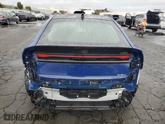 2024 Toyota Prius LE z VIN JTDACAAU3R3036876, wystawiony jako Copart lot #86166715 z przebiegiem 2 948 mil mil oraz Szkoda całkowita • Salvage title. Historia ofert i sprzedaży dostępna na DreamBid. Obrazek 6.