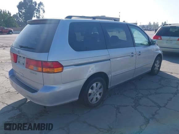 ✅ 2004 Honda Odyssey EX-RES • VIN: 5FNRL18864B149213 • Lot: 42227096. Listed on IAAI with 182,145 mi. Free auction sales archive from the USA and detailed vehicle history report at DreamBid. Image 4.