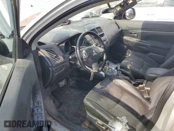 2013 Mitsubishi Outlander LE with VIN 4A4AR5AU1DE022535, listed as a Copart auction lot 70002895 with 297,561 mi miles and Salvage title. Bid and sale history available at DreamBid. Image 8.