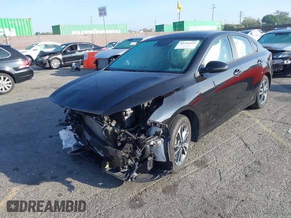 ✅ 2023 Kia Forte LXS • VIN: 3KPF24AD9PE552921 • Lot: 43792222. Listed on IAAI with 28,803 mi. Free auction sales archive from the USA and detailed vehicle history report at DreamBid. Image 17.