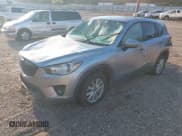 ✅ 2013 Mazda CX-5 Touring • VIN: JM3KE2CE1D0103888 • Lot: 43298744. Listed on IAAI with 305,966 mi. Free auction sales archive from the USA and detailed vehicle history report at DreamBid. Image 2.