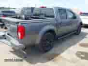 2020 Nissan Frontier SV with VIN 1N6ED0EB4LN726548, listed as a IAAI auction lot 42767637 with 64,100 mi miles and . Bid and sale history available at DreamBid. Image 4.