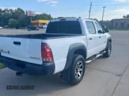 ✅ 2015 Toyota Tacoma PreRunner • VIN: 5TFJX4GN5FX044939 • Lot: 84647775. Listed on Copart with 149,669 mi. Free auction sales archive from the USA and detailed vehicle history report at DreamBid. Image 4.