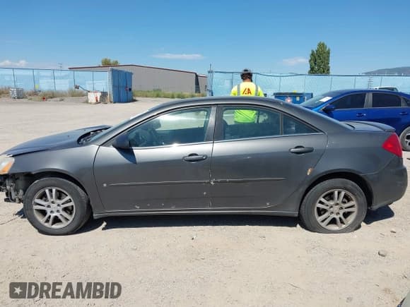 ✅ 2006 Pontiac G6 6-Cyl • VIN: 1G2ZG558564102950 • Лот: 43013387. Опубликован ранее на IAAI с пробегом 186 065 миль. Бесплатный доступ к архиву аукционных продаж из США и подробный отчёт об истории автомобиля на DreamBid. Изображение 15.