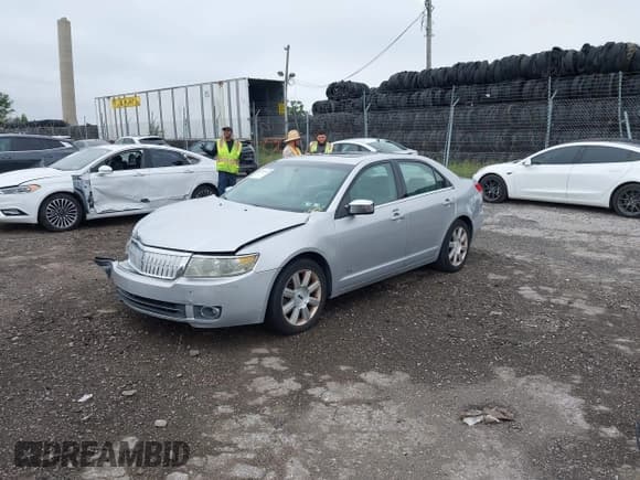 ✅ 2009 Lincoln MKZ • VIN: 3LNHM26T69R623555 • Lot: 43015362. Listed on IAAI with 60,358 mi. Free auction sales archive from the USA and detailed vehicle history report at DreamBid. Image 2.