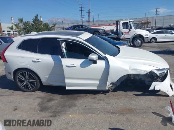 ✅ 2019 Volvo XC60 R-Design • VIN: YV4BR0DM8K1393008 • Lot: 42012083. Wystawiony na IAAI z przebiegiem 72 369 mil. Bezpłatny archiwum sprzedaży aukcyjnych z USA i szczegółowy raport historii pojazdu na DreamBid. Zdjęcie 13.