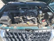 ✅ 2003 Mitsubishi Montero • VIN: JA4LS31R63J025676 • Lot: 71119485. Listed on Copart with 148,946 mi. Free auction sales archive from the USA and detailed vehicle history report at DreamBid. Image 12.