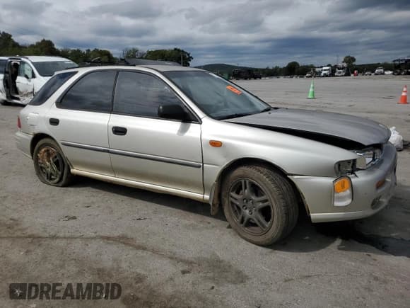 ✅ 1999 Subaru Impreza L • VIN: JF1GF4351XH815210 • Lot: 71250504. Listed on Copart with 141,806 mi. Free auction sales archive from the USA and detailed vehicle history report at DreamBid. Image 4.