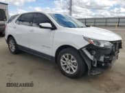 ✅ 2018 Chevrolet Equinox LT • VIN: 3GNAXJEV7JL390231 • Lot: 84586455. Listed on Copart with 65,903 mi. Free auction sales archive from the USA and detailed vehicle history report at DreamBid. Image 4.