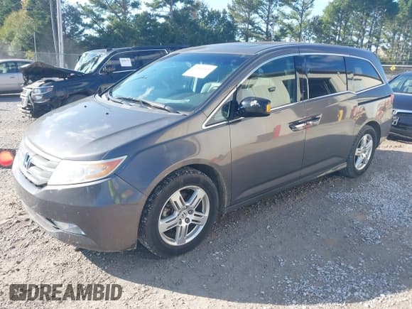✅ 2012 Honda Odyssey Touring • VIN: 5FNRL5H96CB088475 • Lot: 43510401. Listed on IAAI with 156,935 mi. Free auction sales archive from the USA and detailed vehicle history report at DreamBid. Image 17.