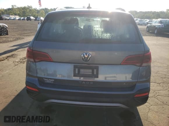 ✅ 2022 Volkswagen Taos S • VIN: 3VVAX7B2XNM085054 • Лот: 70428075. Опубликован ранее на Copart с пробегом 118 030 миль. Бесплатный доступ к архиву аукционных продаж из США и подробный отчёт об истории автомобиля на DreamBid. Изображение 6.